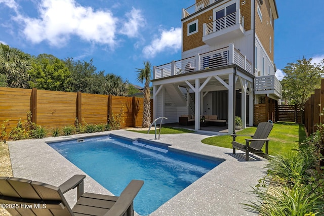 221 Georgia Ave, Carolina Beach, NC 28428 - view of swimming pool featuring a patio, an outdoor living space, and a fenced backyard