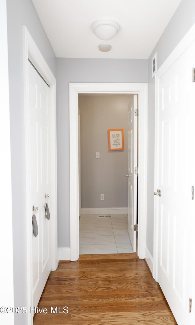 4805 Milliken Close N, Wilson, NC 27896 - hall with baseboards and light wood finished floors