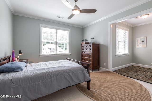 509 Westminster Cir, Greenville, NC 27858 - bedroom with carpet, ornamental molding, baseboards, and a ceiling fan