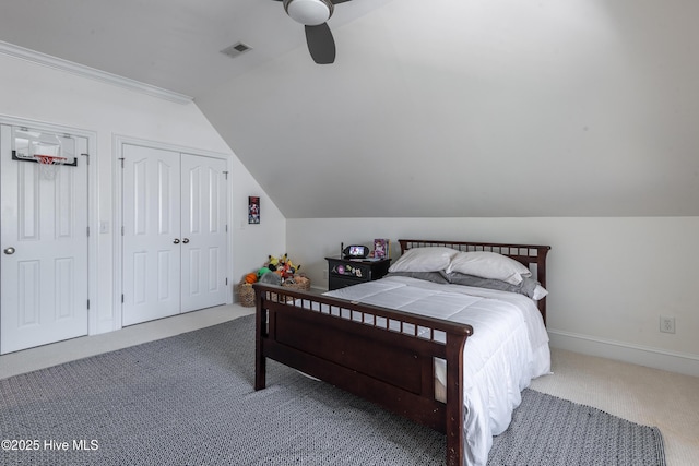 509 Westminster Cir, Greenville, NC 27858 - carpeted bedroom with lofted ceiling, ceiling fan, and baseboards