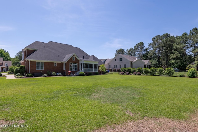 509 Westminster Cir, Greenville, NC 27858 - view of front facade with a front lawn and brick siding