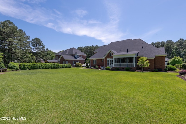 509 Westminster Cir, Greenville, NC 27858 - view of grassy yard featuring a sunroom