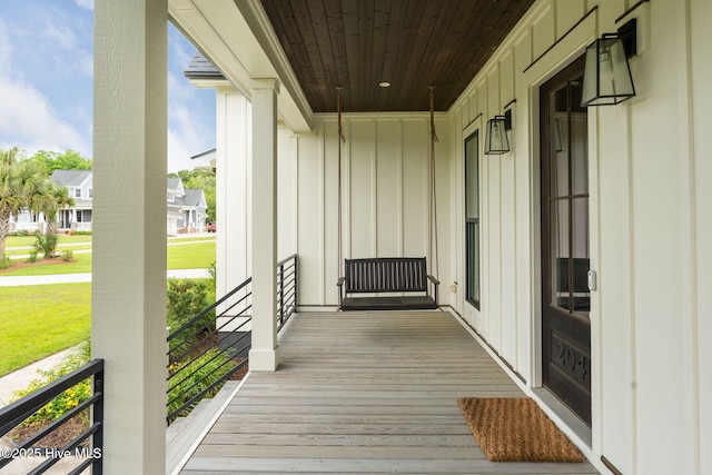 204 N Sea Lily Ct, Hampstead, NC 28443 - view of wooden porch