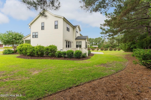 204 N Sea Lily Ct, Hampstead, NC 28443 - view of property exterior featuring a yard