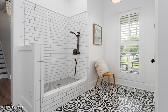 204 N Sea Lily Ct, Hampstead, NC 28443 - bathroom with tiled shower and baseboards