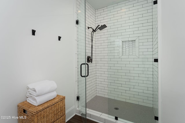 204 N Sea Lily Ct, Hampstead, NC 28443 - bathroom with a stall shower and baseboards