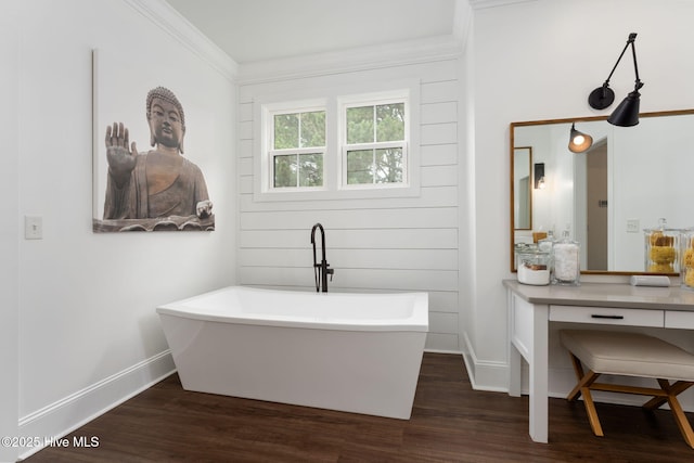 204 N Sea Lily Ct, Hampstead, NC 28443 - full bath featuring a freestanding tub, baseboards, wood finished floors, crown molding, and vanity