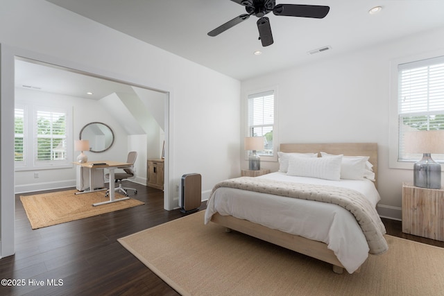 204 N Sea Lily Ct, Hampstead, NC 28443 - bedroom with multiple windows, dark wood-style floors, recessed lighting, a desk, and baseboards