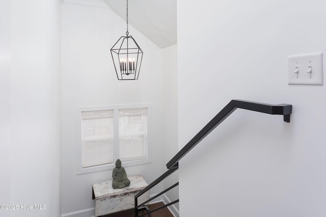 204 N Sea Lily Ct, Hampstead, NC 28443 - detailed view of baseboards and a chandelier