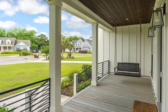 204 N Sea Lily Ct, Hampstead, NC 28443 - porch with a residential view and a yard