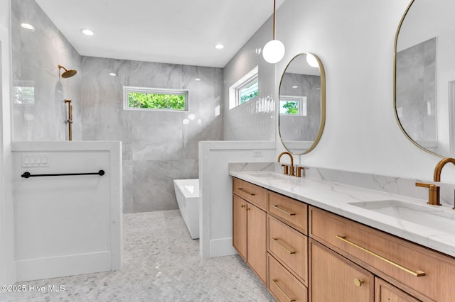 109 Broadview Ln, Hampstead, NC 28443 - full bathroom featuring double vanity, a walk in shower, and a freestanding bath