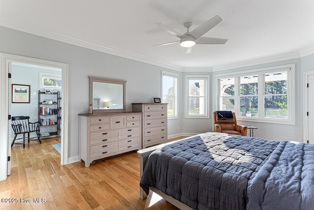 177 National Dr, Pinehurst, NC 28374 - bedroom with crown molding, light wood finished floors, multiple windows, baseboards, and a ceiling fan