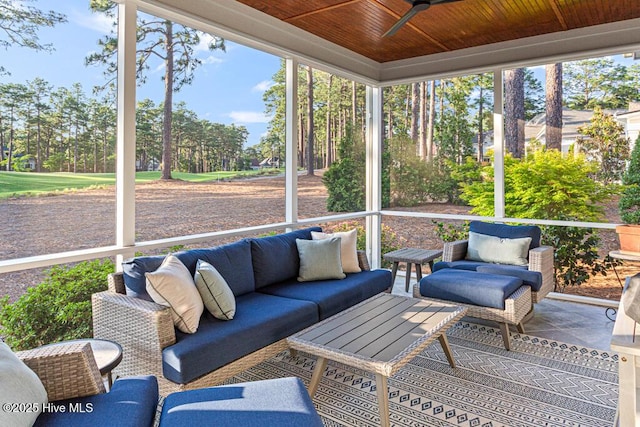 177 National Dr, Pinehurst, NC 28374 - sunroom / solarium with ceiling fan, outdoor lounge area, and view of wooded area