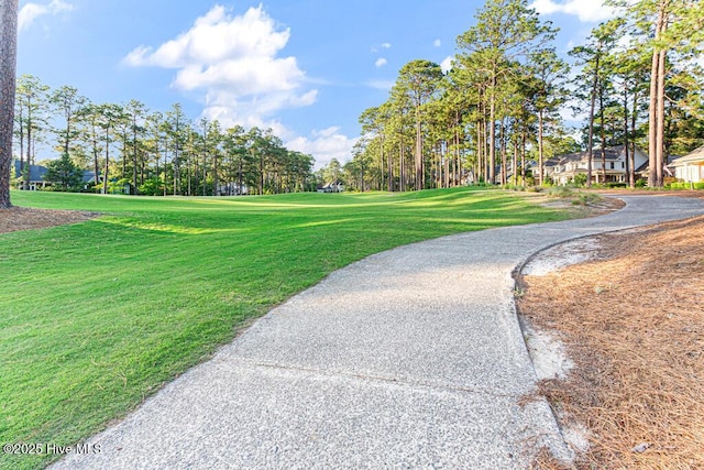 177 National Dr, Pinehurst, NC 28374 - view of home's community with a lawn and view of golf course