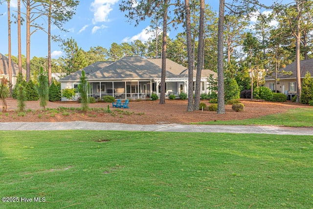 177 National Dr, Pinehurst, NC 28374 - single story home featuring a sunroom and a front yard