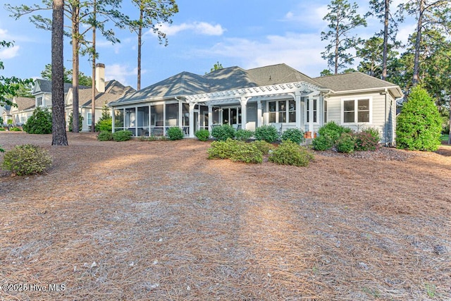 177 National Dr, Pinehurst, NC 28374 - view of front facade featuring a pergola and a sunroom