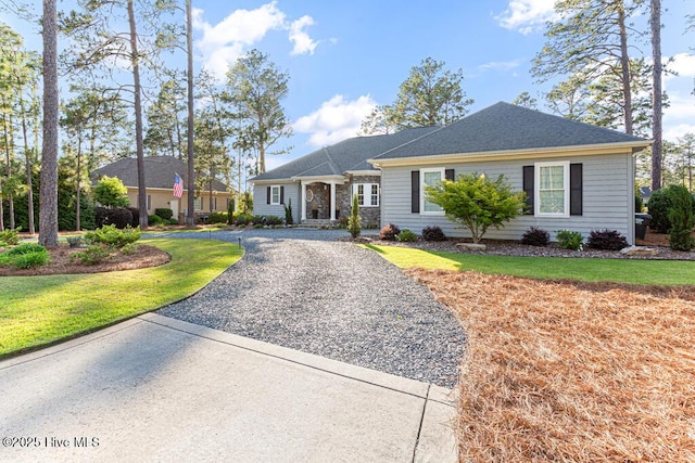 177 National Dr, Pinehurst, NC 28374 - ranch-style house with driveway and a front lawn