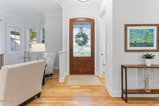 177 National Dr, Pinehurst, NC 28374 - foyer with light wood-type flooring, baseboards, and ornamental molding