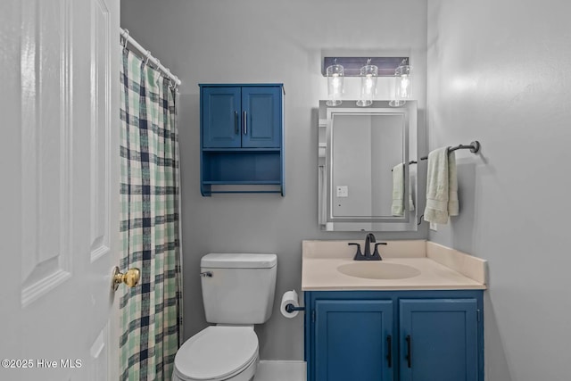 815 Gadwell Loop, Jacksonville, NC 28540 - bathroom featuring toilet, vanity, and a shower with shower curtain
