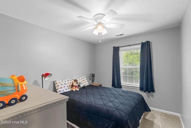 815 Gadwell Loop, Jacksonville, NC 28540 - bedroom featuring carpet flooring, baseboards, and ceiling fan