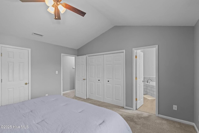 815 Gadwell Loop, Jacksonville, NC 28540 - carpeted bedroom with vaulted ceiling, connected bathroom, a closet, baseboards, and a ceiling fan