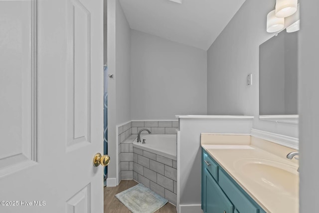 815 Gadwell Loop, Jacksonville, NC 28540 - full bath featuring vanity, a bath, and wood finished floors