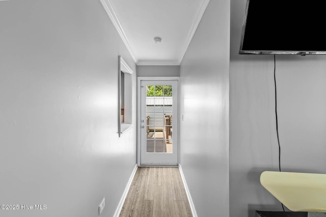 815 Gadwell Loop, Jacksonville, NC 28540 - hallway with crown molding, baseboards, and light wood-style flooring