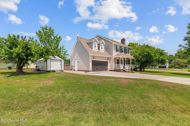 815 Gadwell Loop, Jacksonville, NC 28540 - view of front of home featuring concrete driveway, a front yard, a chimney, a garage, and a storage unit