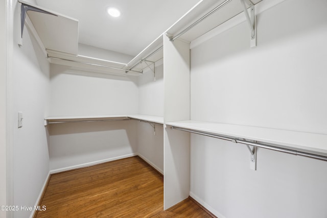 7 Prichard Ln, Pinehurst, NC 28374 - walk in closet featuring wood finished floors