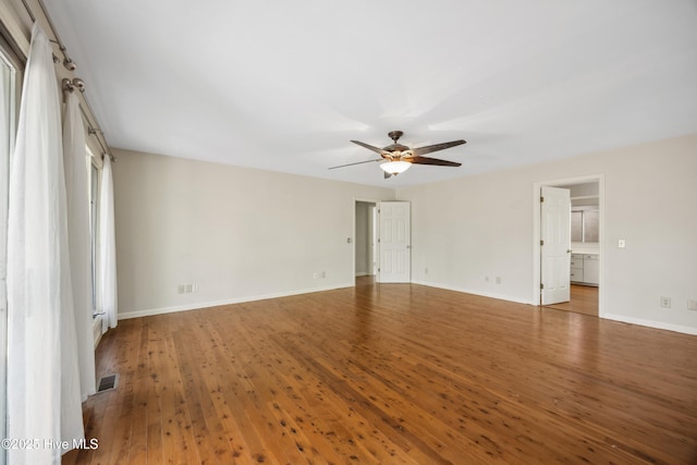 7 Prichard Ln, Pinehurst, NC 28374 - spare room with ceiling fan, wood finished floors, and baseboards