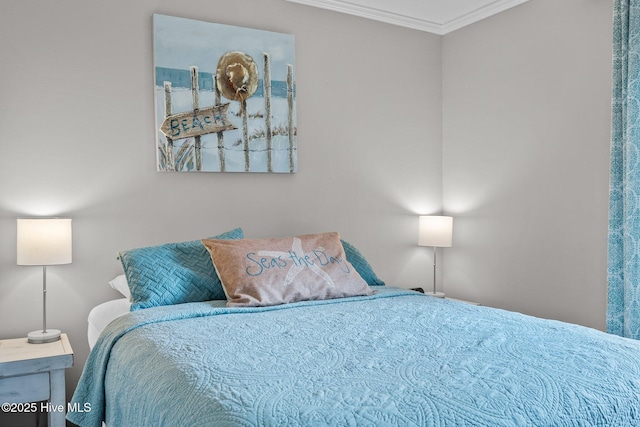bedroom with crown molding