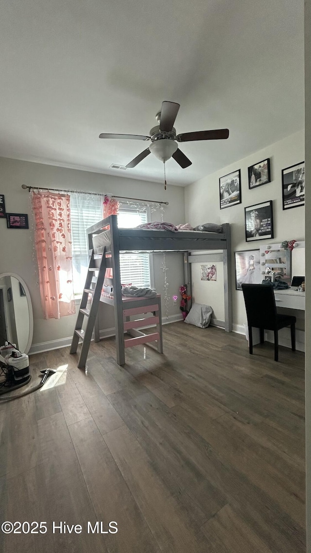 87 Strut Way, Rocky Point, NC 28457 - bedroom with wood finished floors, baseboards, and ceiling fan