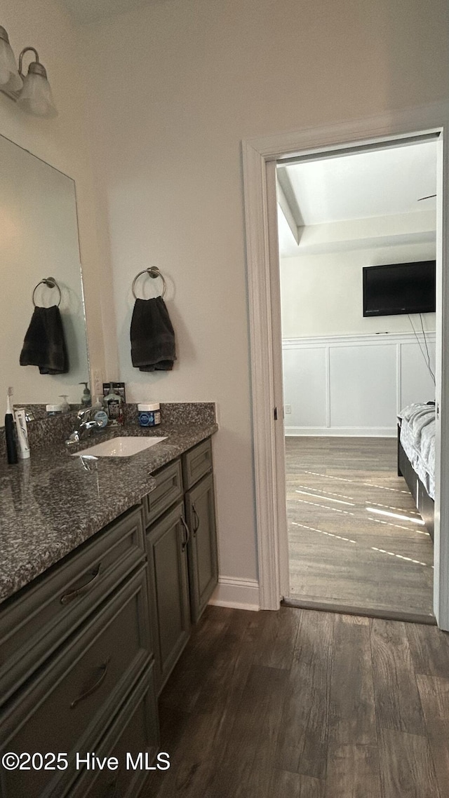 87 Strut Way, Rocky Point, NC 28457 - bathroom featuring wood finished floors, vanity, and baseboards