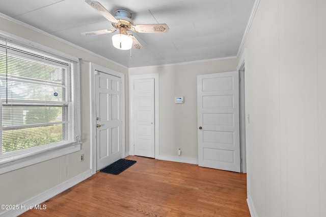 1704 Charlotte Ave, Kinston, NC 28501 - foyer entrance featuring light wood-style flooring, ornamental molding, baseboards, and ceiling fan