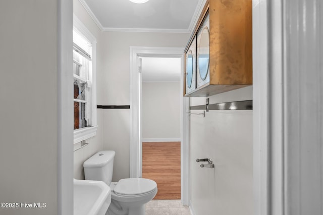 1704 Charlotte Ave, Kinston, NC 28501 - bathroom with toilet and crown molding