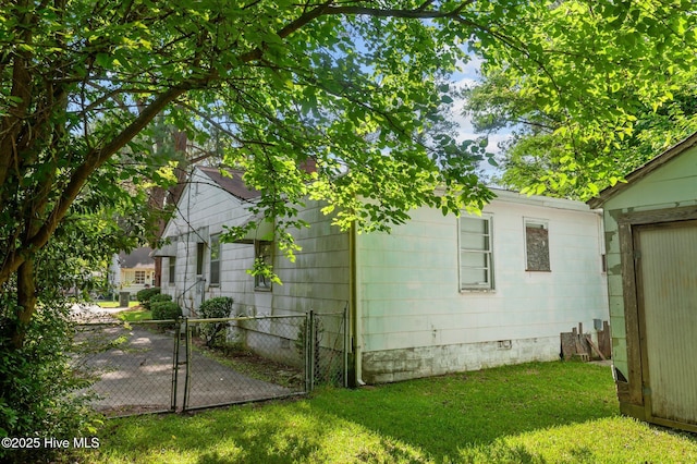 1704 Charlotte Ave, Kinston, NC 28501 - view of property exterior featuring crawl space and a gate