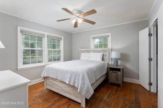 211 Spruce Cir, Wilmington, NC 28403 - bedroom with baseboards, ornamental molding, dark wood-style floors, and ceiling fan