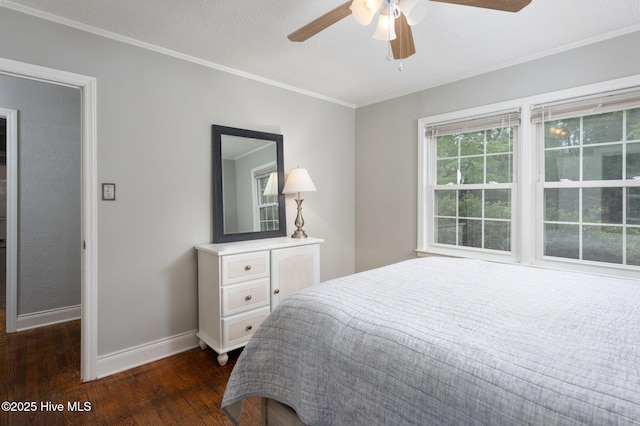 211 Spruce Cir, Wilmington, NC 28403 - bedroom featuring hardwood / wood-style flooring, baseboards, crown molding, and ceiling fan