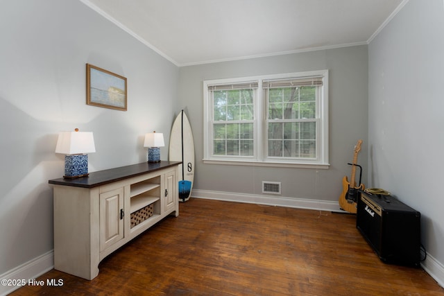 211 Spruce Cir, Wilmington, NC 28403 - interior space featuring crown molding, dark wood finished floors, and baseboards
