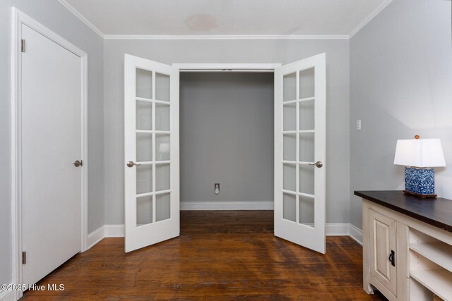 211 Spruce Cir, Wilmington, NC 28403 - corridor with french doors, crown molding, dark wood finished floors, and baseboards