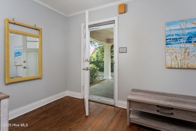 211 Spruce Cir, Wilmington, NC 28403 - entryway with dark wood-style floors, ornamental molding, baseboards, and decorative columns