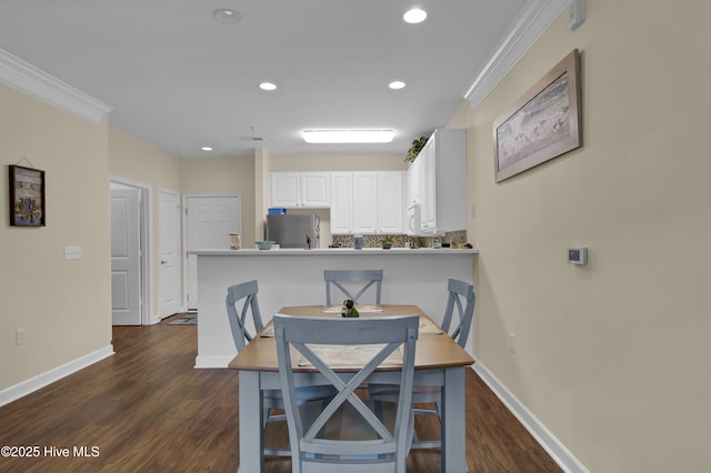 395 S Crow Creek Dr Unit 2306, Calabash, NC 28467 - dining room featuring dark wood-type flooring, crown molding, baseboards, and recessed lighting