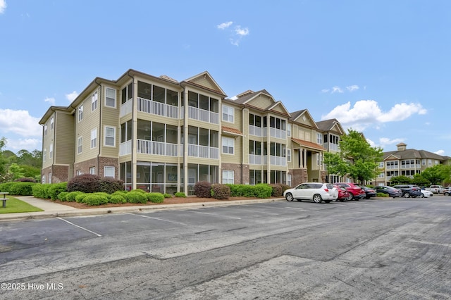 395 S Crow Creek Dr Unit 2306, Calabash, NC 28467 - view of property featuring uncovered parking