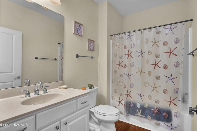 395 S Crow Creek Dr Unit 2306, Calabash, NC 28467 - bathroom with vanity, toilet, shower / bath combination with curtain, and wood finished floors