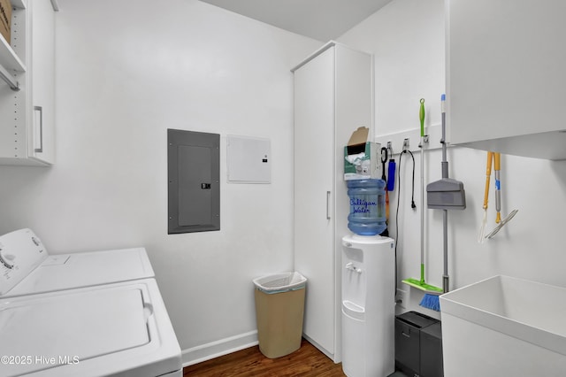 395 S Crow Creek Dr Unit 2306, Calabash, NC 28467 - laundry area featuring electric panel, cabinet space, independent washer and dryer, dark wood-style flooring, and baseboards