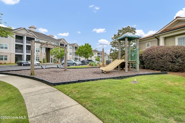 395 S Crow Creek Dr Unit 2306, Calabash, NC 28467 - communal playground with a lawn and a residential view