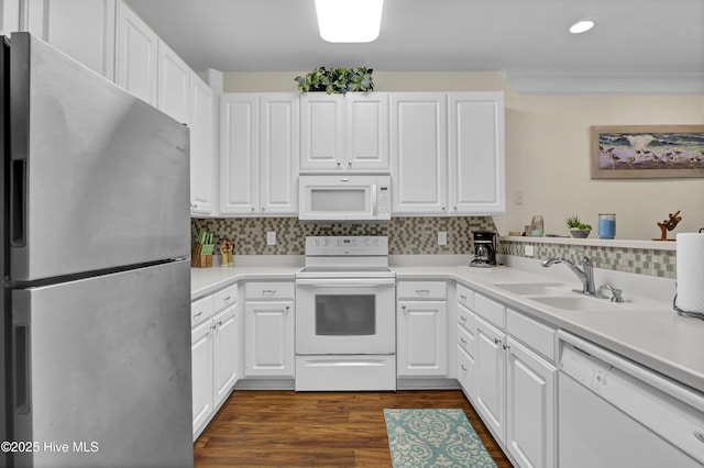 395 S Crow Creek Dr Unit 2306, Calabash, NC 28467 - kitchen with white appliances, a sink, tasteful backsplash, white cabinets, and recessed lighting