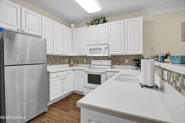 395 S Crow Creek Dr Unit 2306, Calabash, NC 28467 - kitchen featuring white appliances, a sink, white cabinetry, and light countertops