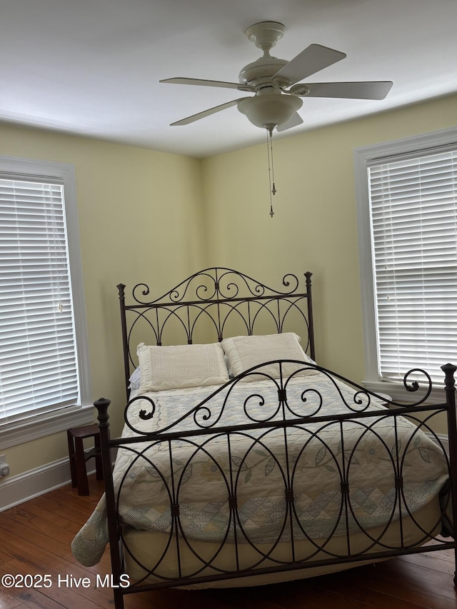 215 W Queen St, Edenton, NC 27932 - bedroom featuring wood finished floors, baseboards, and a ceiling fan