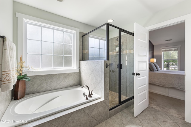 157 Heritage Way, Hampstead, NC 28443 - ensuite bathroom with a bath, a stall shower, and tile patterned flooring